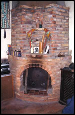 An overall view of an installed Grubka - masonry stove for adobe houses - adobe fireplaces