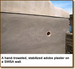 A hand-troweled, stabilized adobe plaster on a SWSA wall.