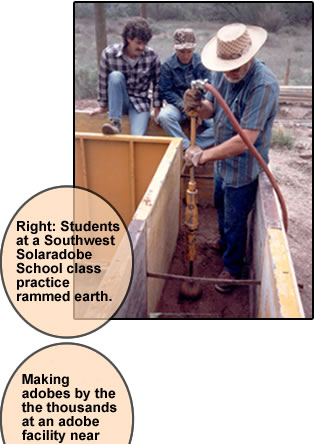 Students at a Southwest solaradobe class practice rammed earth